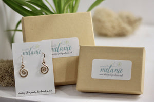 Jewelry boxes with logo and swirl earrings 
